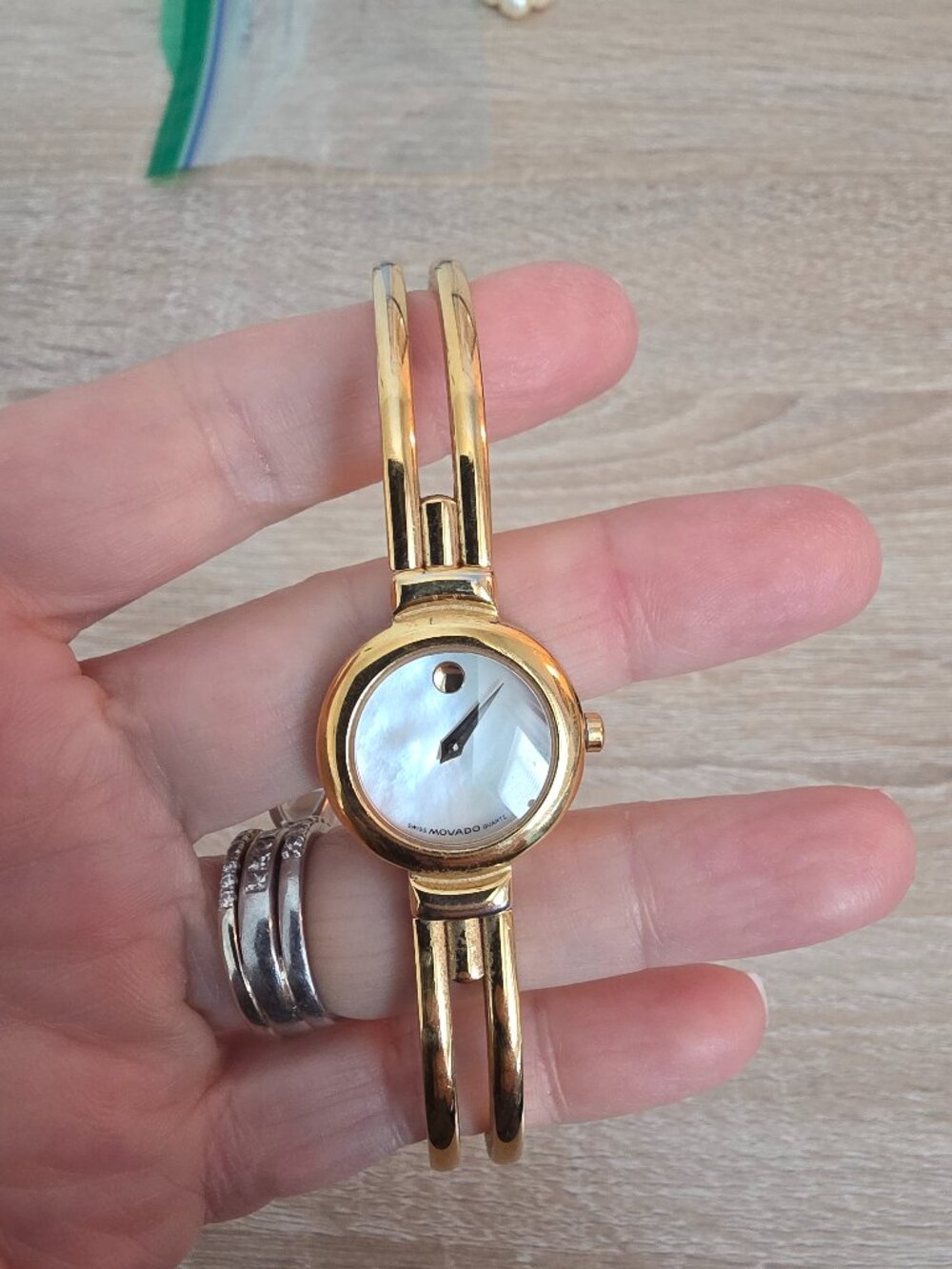 Movado Bangal Watch - Gold w/mother of pearl face